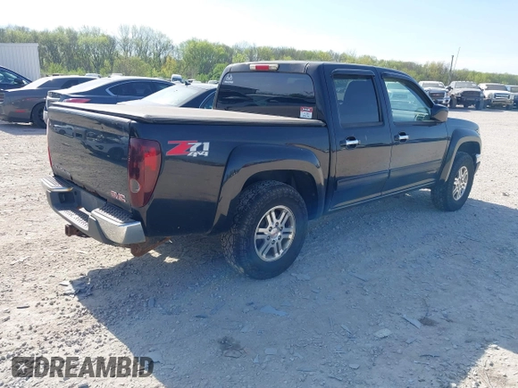 2011 GMC Canyon SLE1 with VIN 1GTH6MFE5B8104838, listed as a IAAI auction lot 42120959 with 188,277 mi miles. Bid and sale history available at carsss.com. Image 4.
