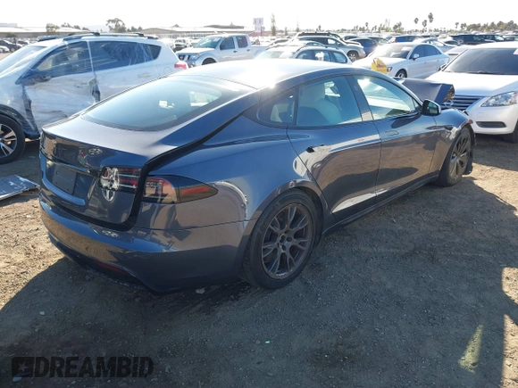 2023 Tesla Model S with VIN 5YJSA1E5XPF500341, listed as a IAAI auction lot 40756406 with 11,583 mi miles and . Bid and sale history available at DreamBid. Image 4.