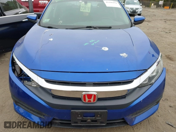 2017 Honda Civic LX with VIN 19XFC2F53HE217867, listed as a IAAI auction lot 42296194 with 104,670 mi miles and . Bid and sale history available at DreamBid. Image 12.