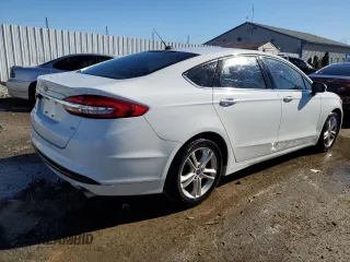 2018 Ford Fusion SE with VIN 3FA6P0H7XJR133458, listed as a Copart auction lot 42201015 with 135,136 mi miles and Salvage Title. Bid and sale history available at carsss.com. Image 3.