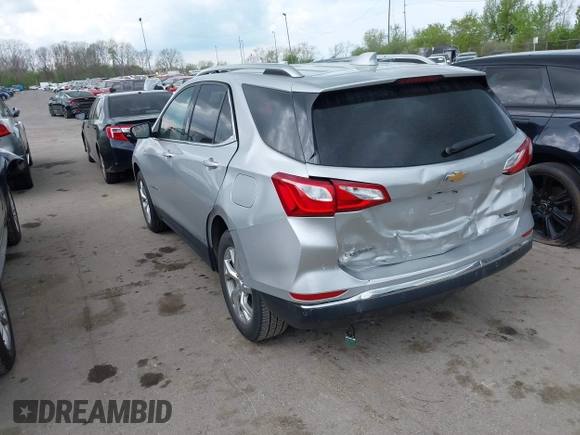 2018 Chevrolet Equinox Premier with VIN 2GNAXMEV7J6106781, listed as a IAAI auction lot 42113301 with 114,585 mi miles. Bid and sale history available at carsss.com. Image 3.