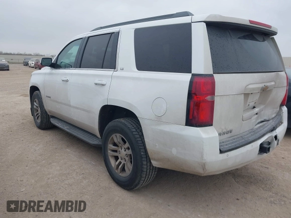 2015 Chevrolet Tahoe LS with VIN 1GNSCAEC2FR641252, listed as a IAAI auction lot 41528667 with 183,796 mi miles and . Bid and sale history available at DreamBid. Image 3.