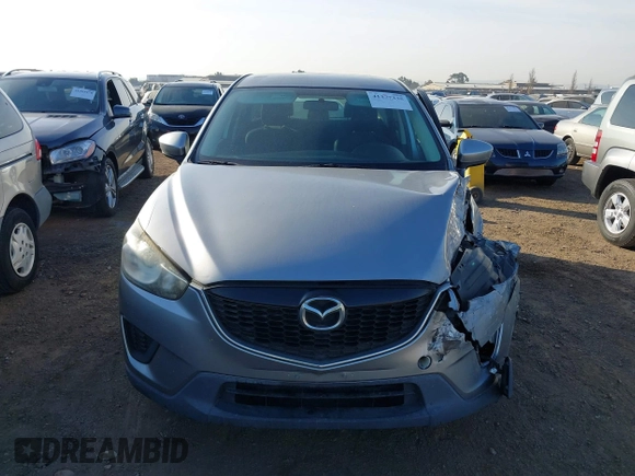 2014 Mazda CX-5 Sport with VIN JM3KE2BE9E0330345, listed as a IAAI auction lot 41377335 with 103,340 mi miles and . Bid and sale history available at carsss.com. Image 12.