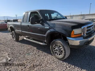 1999 Ford F-250 XL with VIN 1FTNX21FXXEC98957, listed as a Copart auction lot 61476665 with 414,070 mi miles and Salvage title. Bid and sale history available at DreamBid. Image 4.