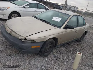 1999 Saturn SL with VIN 1G8ZH5282XZ273375, listed as a IAAI auction lot 41787290 with 230,397 mi miles. Bid and sale history available at carsss.com. Image 2.