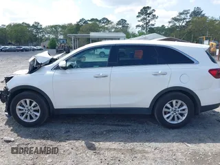 2019 Kia Sorento LX with VIN 5XYPG4A32KG551151, listed as a IAAI auction lot 41883260 with 126,600 mi miles and . Bid and sale history available at carsss.com. Image 15.