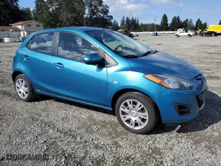 2012 Mazda Mazda2 Sport with VIN JM1DE1KZ2C0137126, listed as a Copart auction lot 73440214 with 141,903 mi miles and Salvage Title. Bid and sale history available at carsss.com. Image 4.