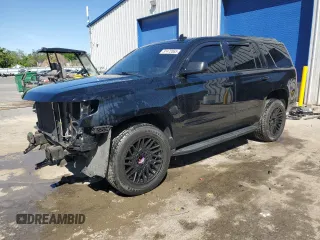 2018 Chevrolet Tahoe Premier with VIN 1GNSCCKC5JR205956, listed as a Copart auction lot 57472065 with 137,516 mi miles and Salvage title. Bid and sale history available at DreamBid. Image 1.