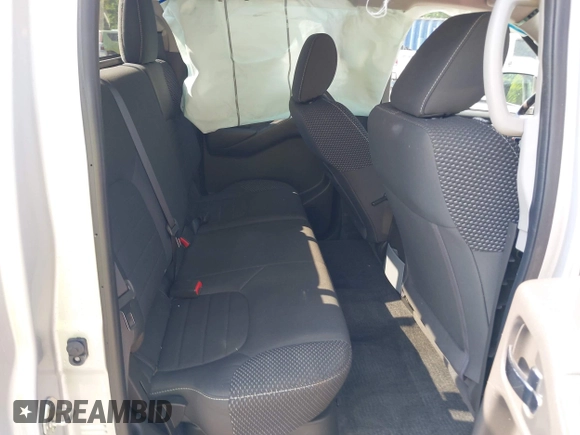 2018 Nissan Frontier SV with VIN 1N6AD0EVXJN743148, listed as a IAAI auction lot 42398810 with 82,286 mi miles and . Bid and sale history available at DreamBid. Image 8.
