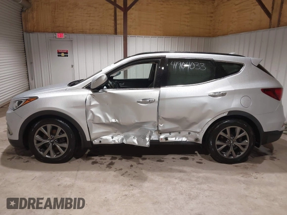 2018 Hyundai Santa Fe Ultimate with VIN 5XYZWDLA9JG502177, listed as a IAAI auction lot 41904033 with 68,000 mi miles and . Bid and sale history available at DreamBid. Image 13.