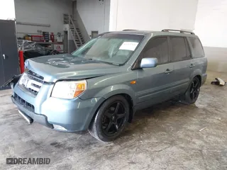 2007 Honda Pilot EX-L with VIN 2HKYF18767H514926, listed as a IAAI auction lot 41717715 with 129,927 mi miles. Bid and sale history available at carsss.com. Image 2.