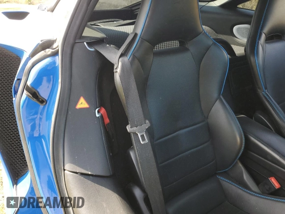 2020 McLaren GT z VIN SBM22GCA8LW000692, wystawiony jako Copart lot #44749324 z przebiegiem 18 911 mil mil oraz Nie do naprawy. Historia ofert i sprzedaży dostępna na DreamBid. Obrazek 10.