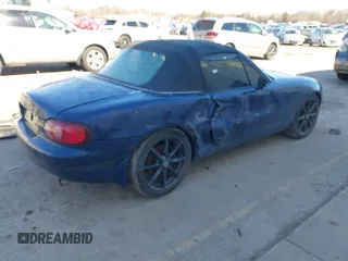 2002 Mazda MX-5 Miata Cloth z VIN JM1NB353920234533, wystawiony jako IAAI lot #41735487 z przebiegiem 112 661 mil mil oraz . Historia ofert i sprzedaży dostępna na DreamBid. Obrazek 4.