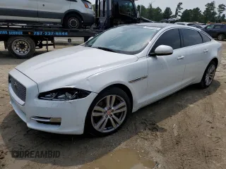 2016 Jaguar XJ Portfolio with VIN SAJWJ2GD9G8W01545, listed as a Copart auction lot 66095984 with Not Provided miles and Salvage Title. Bid and sale history available at DreamBid. Image 1.