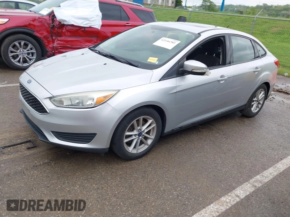 2015 Ford Focus SE with VIN 1FADP3F26FL254588, listed as a IAAI auction lot 42146381 with 99,280 mi miles and . Bid and sale history available at DreamBid. Image 17.