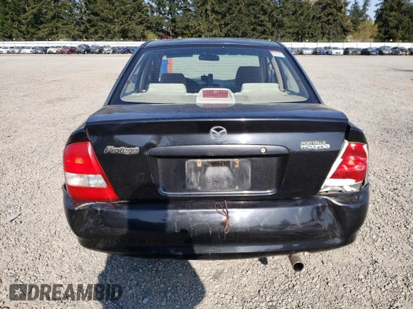 2003 Mazda Protege DX with VIN JM1BJ226231214537, listed as a Copart auction lot 54448615 with 147,753 mi miles and Salvage Title. Bid and sale history available at DreamBid. Image 6.