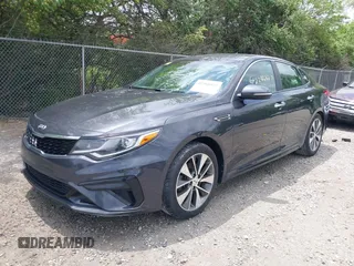 2019 Kia Optima LX z VIN 5XXGT4L32KG298796, wystawiony jako IAAI lot #42266827 z przebiegiem 89 841 mil mil oraz . Historia ofert i sprzedaży dostępna na DreamBid. Obrazek 2.