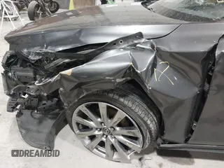 2020 Mazda 3 Premium with VIN 3MZBPBEM3LM123091, listed as a IAAI auction lot 41568213 with 68,515 mi miles and . Bid and sale history available at DreamBid. Image 21.