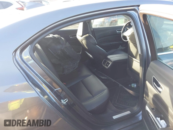 2019 Acura TLX with VIN 19UUB2F30KA002614, listed as a IAAI auction lot 41569334 with 96,320 mi miles and . Bid and sale history available at DreamBid. Image 8.