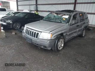 2001 Jeep Grand Cherokee Laredo with VIN 1J4GX48S51C708990, listed as a IAAI auction lot 41656323 with 198,124 mi miles and . Bid and sale history available at DreamBid. Image 16.