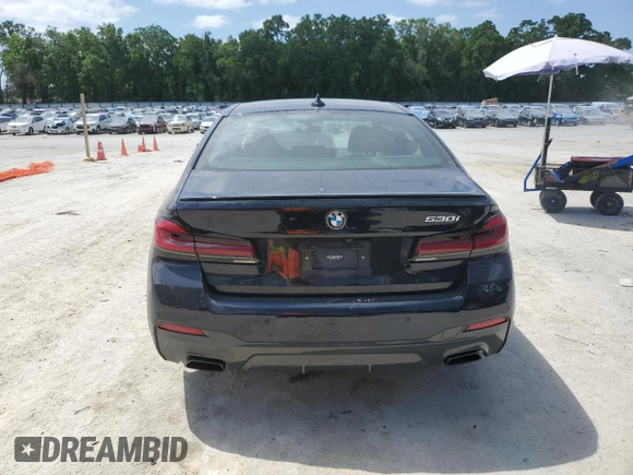 2023 BMW 5 Series 530i with VIN WBA53BH04PWY02486, listed as a Copart auction lot 54519385 with 26,979 mi miles and Salvage title. Bid and sale history available at DreamBid. Image 6.