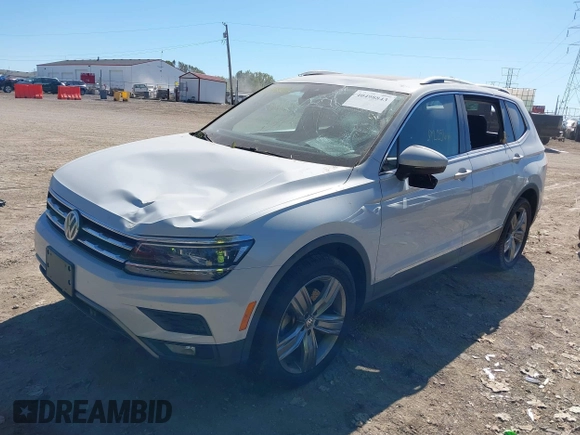 2018 Volkswagen Tiguan SEL Premium with VIN 3VV5B7AX5JM004713, listed as a IAAI auction lot 40498843 with 92,256 mi miles and . Bid and sale history available at DreamBid. Image 2.