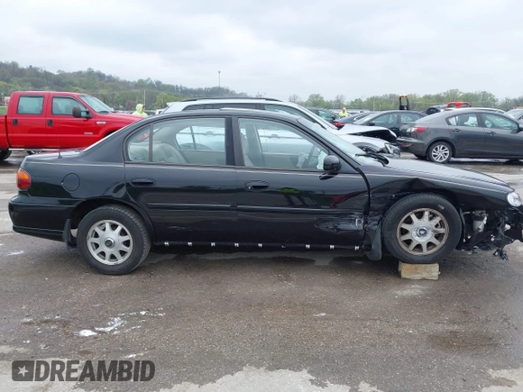 1999 Chevrolet Malibu LS with VIN 1G1NE52M1X6202060, listed as a IAAI auction lot 42011861 with 203,273 mi miles and . Bid and sale history available at DreamBid. Image 13.