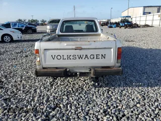 1982 Volkswagen Rabbit z VIN 1MB0174CV060266, wystawiony jako Copart lot #49385145 z przebiegiem 118 498 mil mil oraz Szkody całkowita. Historia ofert i sprzedaży dostępna na DreamBid. Obrazek 6.