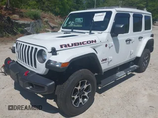 2021 Jeep Wrangler Unlimited Rubicon with VIN 1C4HJXFG5MW586842, listed as a IAAI auction lot 42186683 with 76,450 mi miles and . Bid and sale history available at DreamBid. Image 2.