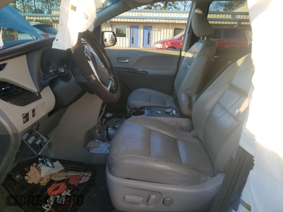 2016 Toyota Sienna XLE с VIN 5TDYK3DC6GS691111, выставлен на аукционе Copart как лот 87195014 с пробегом 196 691 миль миль и Списание • Salvage title. История ставок и продаж доступна на DreamBid. Изображение 7.