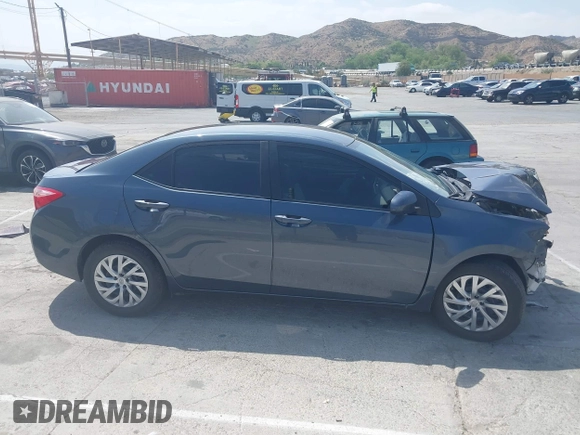 2019 Toyota Corolla L z VIN 2T1BURHE4KC215942, wystawiony jako IAAI lot #42104097 z przebiegiem 87 020 mil mil oraz . Historia ofert i sprzedaży dostępna na DreamBid. Obrazek 13.