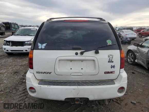 2004 GMC Envoy SLT z VIN 1GKDT13S242171925, wystawiony jako Copart lot #46262535 z przebiegiem 200 396 mil mil oraz Szkoda całkowita • Salvage title. Historia ofert i sprzedaży dostępna na DreamBid. Obrazek 6.