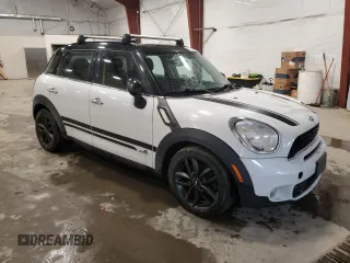 2013 MINI Countryman S ALL4 with VIN WMWZC5C56DWM15763, listed as a Copart auction lot 51165565 with 165,494 mi miles and Salvage Title. Bid and sale history available at DreamBid. Image 4.