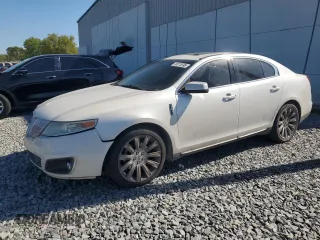 2012 Lincoln MKS with VIN 1LNHL9DR1CG805164, listed as a Copart auction lot 48375595 with 104,246 mi miles and Salvage Title. Bid and sale history available at carsss.com. Image 1.