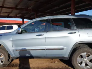 2012 Jeep Grand Cherokee Limited with VIN 1C4RJFBG2CC317363, listed as a IAAI auction lot 41689903 with 158,020 mi miles. Bid and sale history available at carsss.com. Image 15.