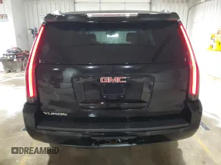 2015 GMC Yukon SLE with VIN 1GKS2AKC3FR664740, listed as a Copart auction lot 53824145 with 194,655 mi miles and Salvage Title. Bid and sale history available at carsss.com. Image 6.