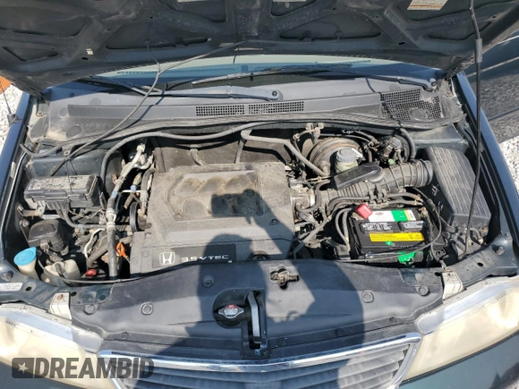 2001 Honda Odyssey EX z VIN 2HKRL18661H539370, wystawiony jako Copart lot #58513055 z przebiegiem 151 607 mil mil oraz Czysty tytuł • Clean title. Historia ofert i sprzedaży dostępna na DreamBid. Obrazek 12.