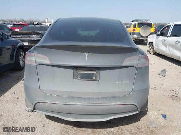 2023 Tesla Model Y Long Range with VIN 7SAYGDEE5PA035722, listed as a IAAI auction lot 41726067 with 34,357 mi miles. Bid and sale history available at carsss.com. Image 16.