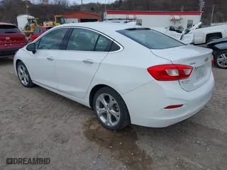2016 Chevrolet Cruze Premier with VIN 1G1BG5SM4G7270991, listed as a IAAI auction lot 41882518 with 71,398 mi miles. Bid and sale history available at carsss.com. Image 3.