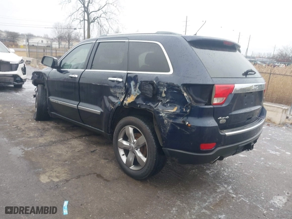 2012 Jeep Grand Cherokee Overland with VIN 1C4RJFCT9CC182216, listed as a IAAI auction lot 41490446 with 153,237 mi miles. Bid and sale history available at carsss.com. Image 3.
