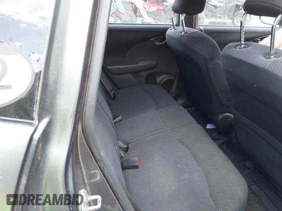 2013 Honda Fit Sport with VIN JHMGE8H54DC060946, listed as a IAAI auction lot 42095655 with 117,729 mi miles. Bid and sale history available at carsss.com. Image 8.