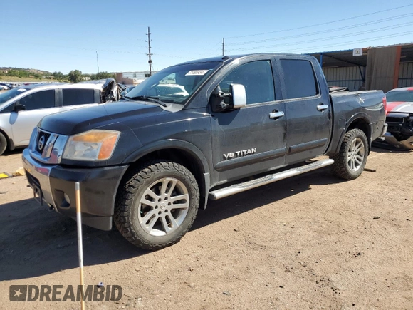 2014 Nissan Titan Pro-4X with VIN 1N6AA0EC2EN519983, listed as a Copart auction lot 71496934 with 150,259 mi miles and Salvage title. Bid and sale history available at DreamBid. Image 1.