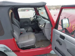 1998 Jeep Wrangler SE with VIN 1J4FY29PXWP785510, listed as a IAAI auction lot 41998116 with 92,390 mi miles and . Bid and sale history available at DreamBid. Image 5.