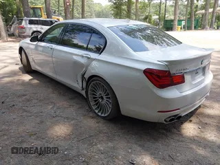 2013 BMW 7 Series 750Li with VIN WBAYE8C55DDS16013, listed as a IAAI auction lot 42709519 with 123,405 mi miles and . Bid and sale history available at DreamBid. Image 3.