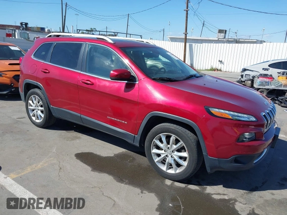 2015 Jeep Cherokee Limited with VIN 1C4PJMDB1FW599205, listed as a IAAI auction lot 41709308 with 112,415 mi miles. Bid and sale history available at carsss.com. Image 1.