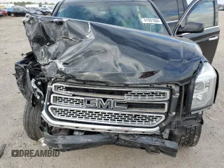 2019 GMC Yukon XL SLT with VIN 1GKS1GKC5KR327079, listed as a Copart auction lot 66189284 with 115,038 mi miles and Salvage Title. Bid and sale history available at carsss.com. Image 13.