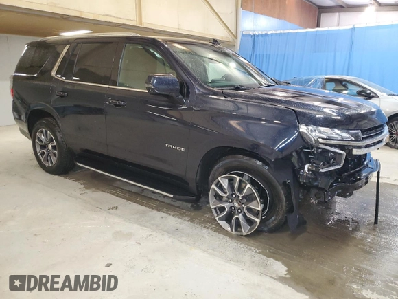 2023 Chevrolet Tahoe LT with VIN 1GNSCNKD0PR380094, listed as a Copart auction lot 48987865 with 51,372 mi miles and Clean title. Bid and sale history available at DreamBid. Image 4.