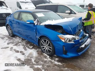 2016 Scion tC z VIN JTKJF5C74GJ023612, wystawiony jako IAAI lot #41555614 z przebiegiem 132 184 mil mil oraz . Historia ofert i sprzedaży dostępna na DreamBid. Obrazek 1.