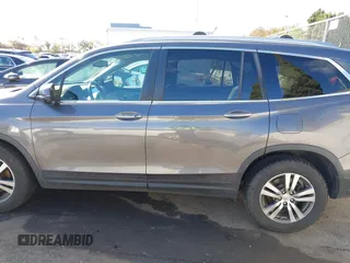 2017 Honda Pilot EX-L with VIN 5FNYF6H57HB021350, listed as a IAAI auction lot 41673635 with 101,980 mi miles and . Bid and sale history available at DreamBid. Image 14.