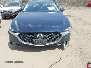 2021 Mazda 3 S with VIN 3MZBPAAL2MM253405, listed as a IAAI auction lot 41836752 with 63 mi miles and . Bid and sale history available at DreamBid. Image 16.
